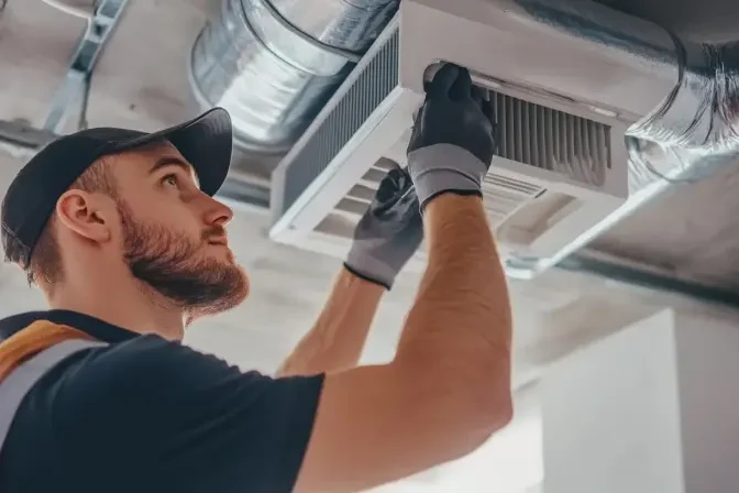 HRV system air quality services Certified technician repairing a gas furnace in Coquitlam home